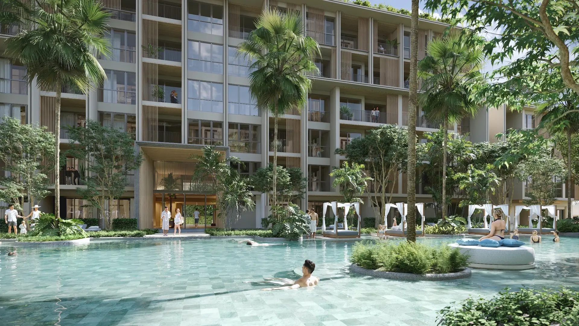 Swimming pool framed by the residence buildings at Sudara Residences, Bang Tao, Phuket